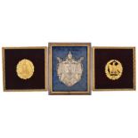 2 French Napoleonic period badges, gilt eagle in wreath with solid background and similar pierced