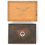 A wooden cigarette box, the lid carved with a Luftwaffe eagle and inscription around the edge to “