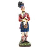 A well modelled painted Sitzendorf porcelain figure “93rd Highlanders 1815”, officer in full