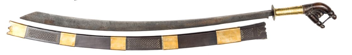 A god 19th century Sumatran sword klewang, curved swollen blade 29½”, with hatchet point, small