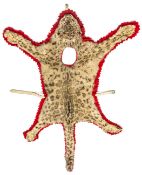 A bass drummer’s cheetah skin apron, on scarlet cloth backing, with aperture for drummer’s head, the