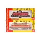 2 Fleischmann HO locomotives. A DB class 212 Bo-Bo centre cab diesel locomotive 212-181-2 in maroon,