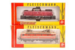 2 Fleischmann HO locomotives. A DB class 212 Bo-Bo centre cab diesel locomotive 212-181-2 in maroon,