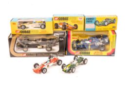 5 Corgi Toys single seat racing cars. A JPS Lotus (154) in black, RN1. A Lotus Climax F1 (155) in
