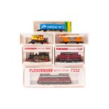 13 N gauge including locomotives and freight rolling stock by Fleischmann and Minitrix. 3