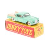 A Dinky Toys Studebaker Golden Hawk (169). A late example in light green and cream, example with