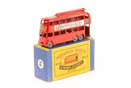 Matchbox Series No.56 Trolley Bus. Example in red with red poles and grey plastic wheels, Peardrax