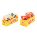 2 Dinky Toys. A Triumph TR2 Sports (111). An example in pink with mid blue interior and wheels,