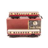 A Trix OO Scale Model Diesel Flier 20/58. A two-coach unit with lights in maroon and cream German DB