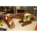 A wooden hand-made JCB/CAT style tracked excavator. An impressive model finished in iroko and beech,