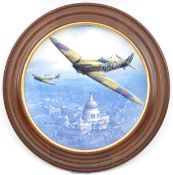 A R. Doulton limited edition porcelain plate “Spitfire over St Paul’s”, diam 8”, in wooden frame,