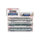 9 N gauge locomotives and coaches by Fleischmann and Minitrix. A Swiss SBB-CFF Bo-Bo electric