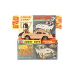 A Corgi Toys James Bond Aston Martin DB5 (261). An early example in metallic gold with red interior.