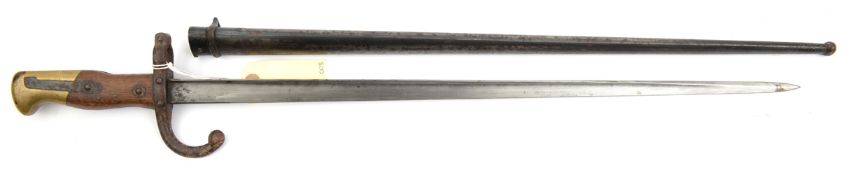 A French M1874 Gras bayonet, marked “Mre d’Armes de St Etienne, Mars 1879” on backstrap, in