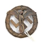 A Third Reich bronze Motor sport badge, with plain back nd flat pin. GC