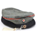 A WWI type German peakless cap, feldmutz, of field grey felt with black band, red piping and
