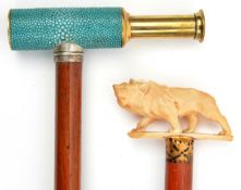 A polished walking cane, the handle in the form of an imitation shagreen covered miniature brass