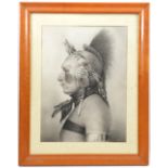 A charcoal head and shoulders sideview portrait of an American Indian chief, 20” x 13½”, mounted and
