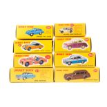 8 Atlas Dinky Toys. Packard Eight Sedan (39) in dark green, Triumph TR2 Sports (111) in pink with