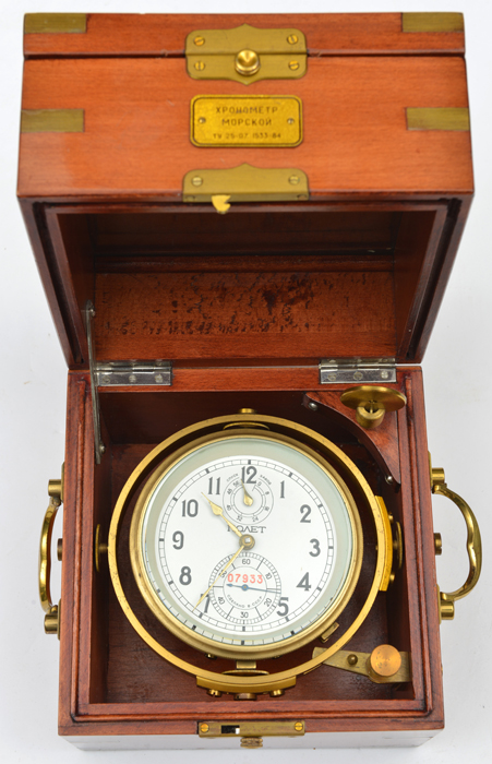 A high quality Russian chronometer, gimbal ring mounted inside highly polished brass mounted