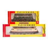 2 Fleischmann HO electric locomotives. A DB class 103 Co-Co locomotive 103-118-6 in cream, maroon