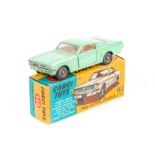 Corgi Ford Mustang Fastback 2+2 (320). An example in light green with cream interior, fitted with