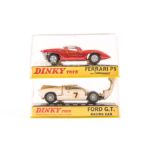 2 Dinky Toys cars. A Ford GT (215) in white RN7 and a Ferrari P5 (220) in metallic red. Both