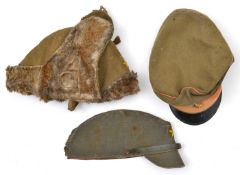 A WWII Japanese soldier’s peaked forage type cap, of grey rubberised hessian type material, with