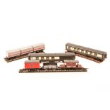 A quantity of N gauge passenger and freight rolling stock by various makes. 12 passenger coaches –