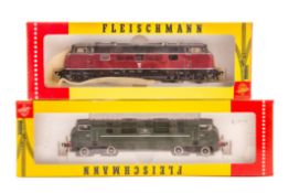 2 Fleischmann HO diesel locomotives. A DB Bo-Bo diesel hydraulic locomotive 221-131-6 in maroon