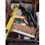 BOX OF BRUSH HEADS, SHOVELS AND TWO SPIRIT LEVELS