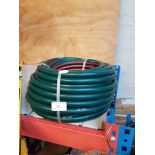 ROLL OF GARDEN HOSE