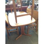 A TEAK EXTENDING DINING TABLE AND 4 HIGH BACK CHAIRS