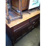 LARGE OAK CHEST WITH IRON STRAP JINGES AND DRAWRS AND CUPBORD. W138CM