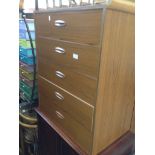 A CHEST OF DRAWERS