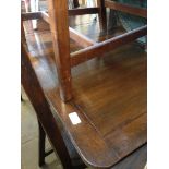 AN OAK DROP LEAF TABLE