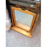 A DRESSING TABLE MIRROR