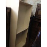 THREE WHITE BOOKSHELVES