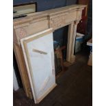 A FIRE SURROUND AND HEARTH