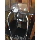 A GLASS 2 TIER TABLE
