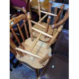 A SET OF 4 PINE KITCHEN CHAIRS