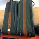 2 'REVELATION' GREEN SUITCASES