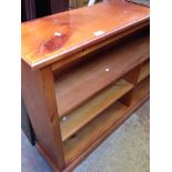 AN OPEN PINE BOOKCASE