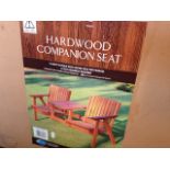 A FLATPACK HARDWOOD COMPANION GARDEN SEAT