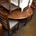 CIRCULAR OAK EXTENDING TABLE AND FOUR LADDER BACK CHAIRS. D107CM