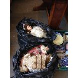 2 BAGS OF DOLLS