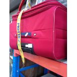 A RED TRAVEL CASE