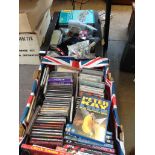 A BOX OF CDS AND A BOX WITH HAYNES MANUALS AND OTHER ELECTRICAL ACCESSORIES