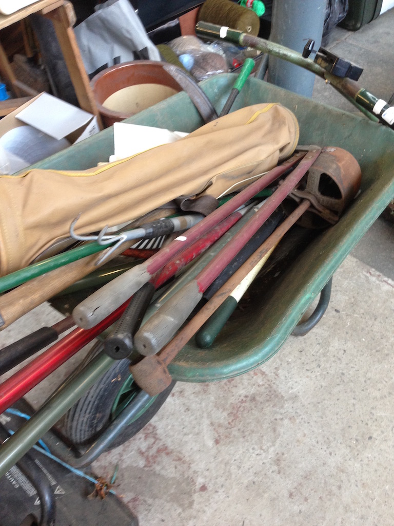 A WHEEL BARROW AND CONTENTS