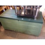 A GREEN PLASTIC GARDEN CHEST